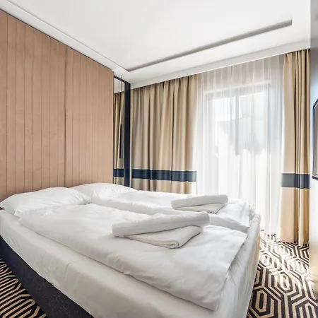 Апартаменты Apartamenty Sun&Snow W Obiekcie Baltic Park Fort Свиноуйсьце